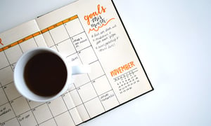 set-goals-on-a-calendar-with-coffee