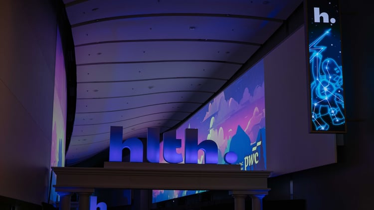 an example of projection mapping in a hallway at HLTH 2025