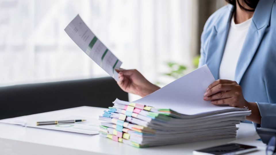 example photo of a person holding an RFP document