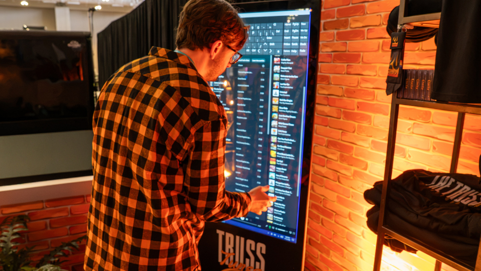 image of an attendee using the truss tunes activation